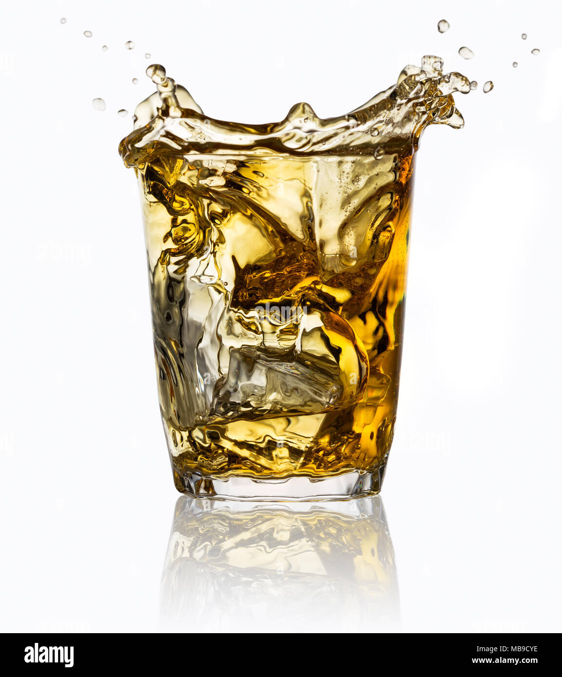 Whiskey Splash With Ice Cubes Isolated On White Stock Photo