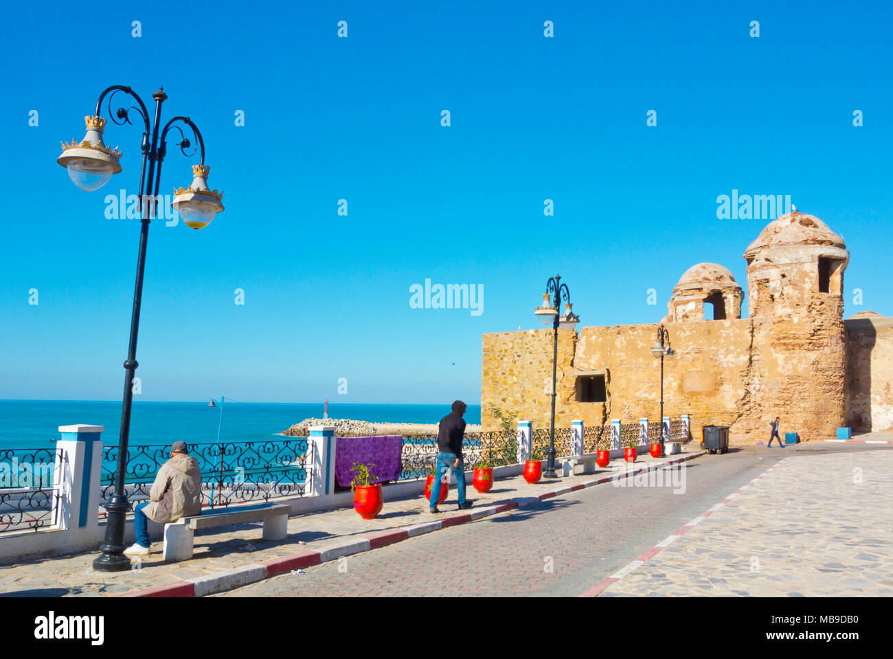 Seaside promenade, ruins of Kasbah, Larache, northern Morocco, Africa Stock Photo