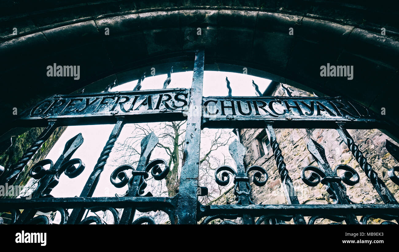 Detail of old gates at entrance to Greyfriars Churchyard ( Greyfriars kirkyard) in Old Town of Edinburgh, Scotland, United Kingdom Stock Photo