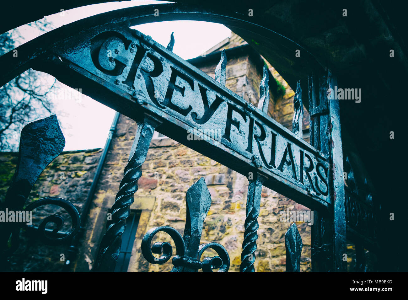 Detail of old gates at entrance to Greyfriars Churchyard ( Greyfriars kirkyard) in Old Town of Edinburgh, Scotland, United Kingdom Stock Photo