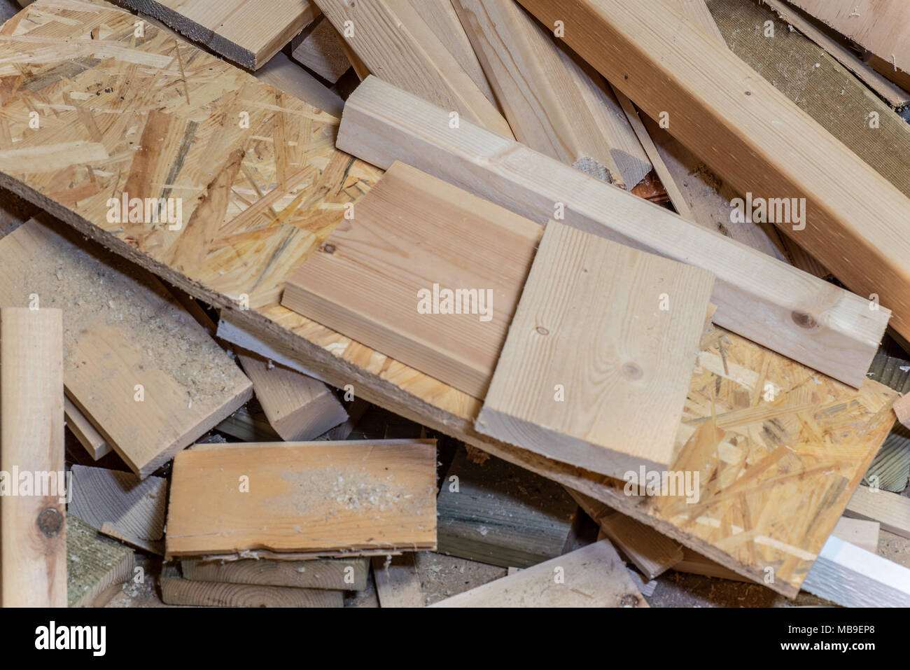 a pile of different sorts of woods and planks Stock Photo