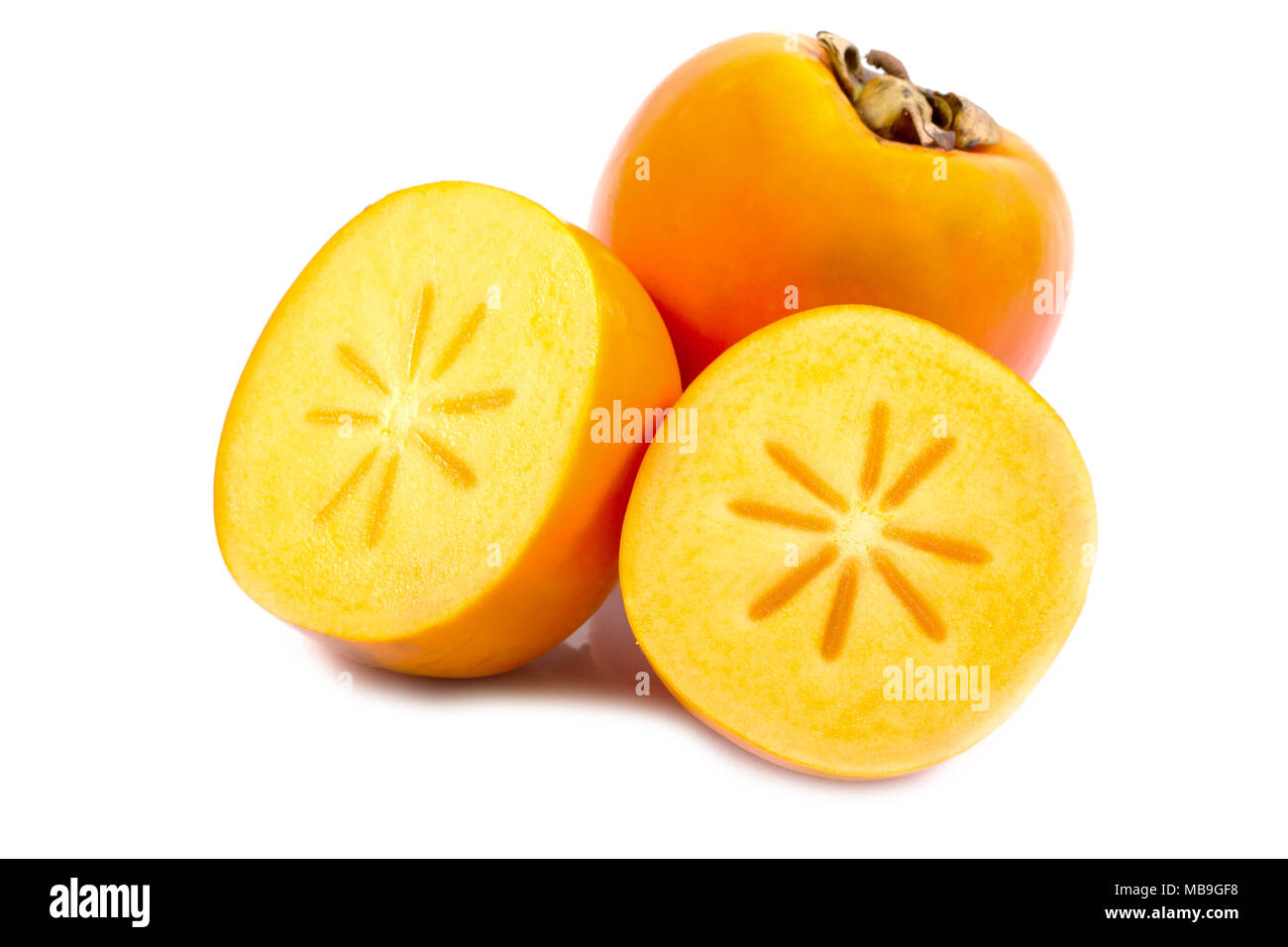 Persimmon fruit cut in half hires stock photography and images Alamy