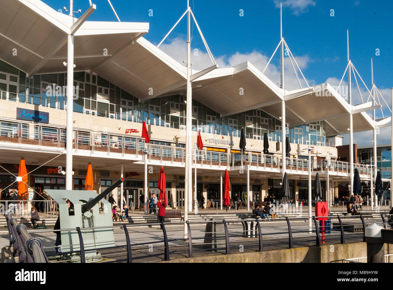 Shops, bars and restaurants at Gunwharf Quays, a retail development on