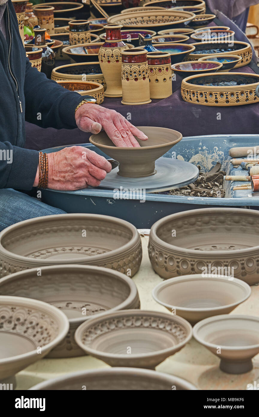 Potter producing ornate bowls at a craft market in Stratford upon Avon Stock Photo