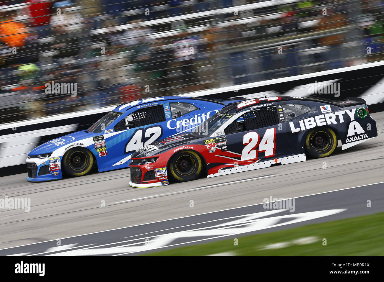 Ft. Worth, Texas, USA. 8th Apr, 2018. April 08, 2018 - Ft. Worth, Texas, USA: Kyle Larson (42) and William Byron (24) battle for position during the O'Reilly Auto Parts 500 at Texas Motor Speedway in Ft. Worth, Texas. Credit: Chris Owens Asp Inc/ASP/ZUMA Wire/Alamy Live News Stock Photo