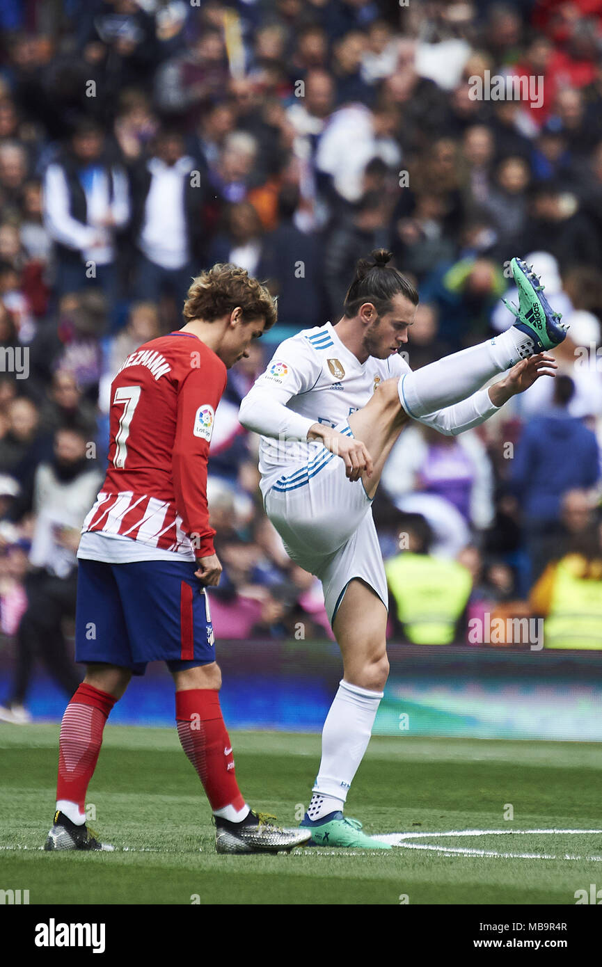 April 8, 2018 - Madrid, Spain - Gareth Bale (midfielder; Real Madrid),  Antoine Griezmann (forward; Atletico Madrid) in action during La Liga match  between Real Madrid and Atletico de Madrid at Santiago
