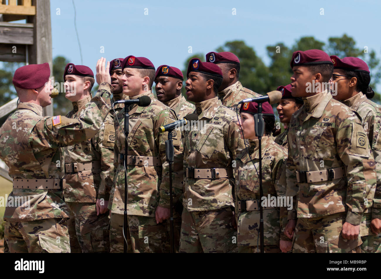 Pinehurst, North Carolina, USA. 8th Apr, 2018. April 8, 2018 - Pinehurst, N.C., USA - The 82nd Airborne Division All American Chorus performs during the opening ceremony at the 69th annual Spring Matinee Harness races sponsored by the Pinehurst Driving & Training Club, at the Pinehurst Harness Track, Pinehurst, N.C. The Pinehurst Harness Track is a 111-acre equestrian facility that has been a winter training center for standardbred horses since 1915. This year's races commemorate the 103rd anniversary of the track. Credit: Timothy L. Hale/ZUMA Wire/Alamy Live News Stock Photo