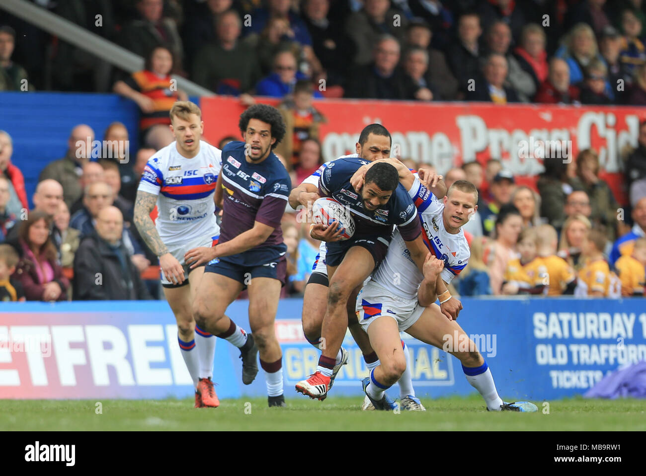 Wakefield, UK. 8th April 2018, Beaumont Legal Stadium, Wakefield, England; Betfred Super League rugby, Wakefield Trinity v Leeds Rhinos; Kallum Watkins of Leeds Rhinos is tackled by Jacob Miller of Wakefield Trinity Credit: News Images/Alamy Live News Stock Photo