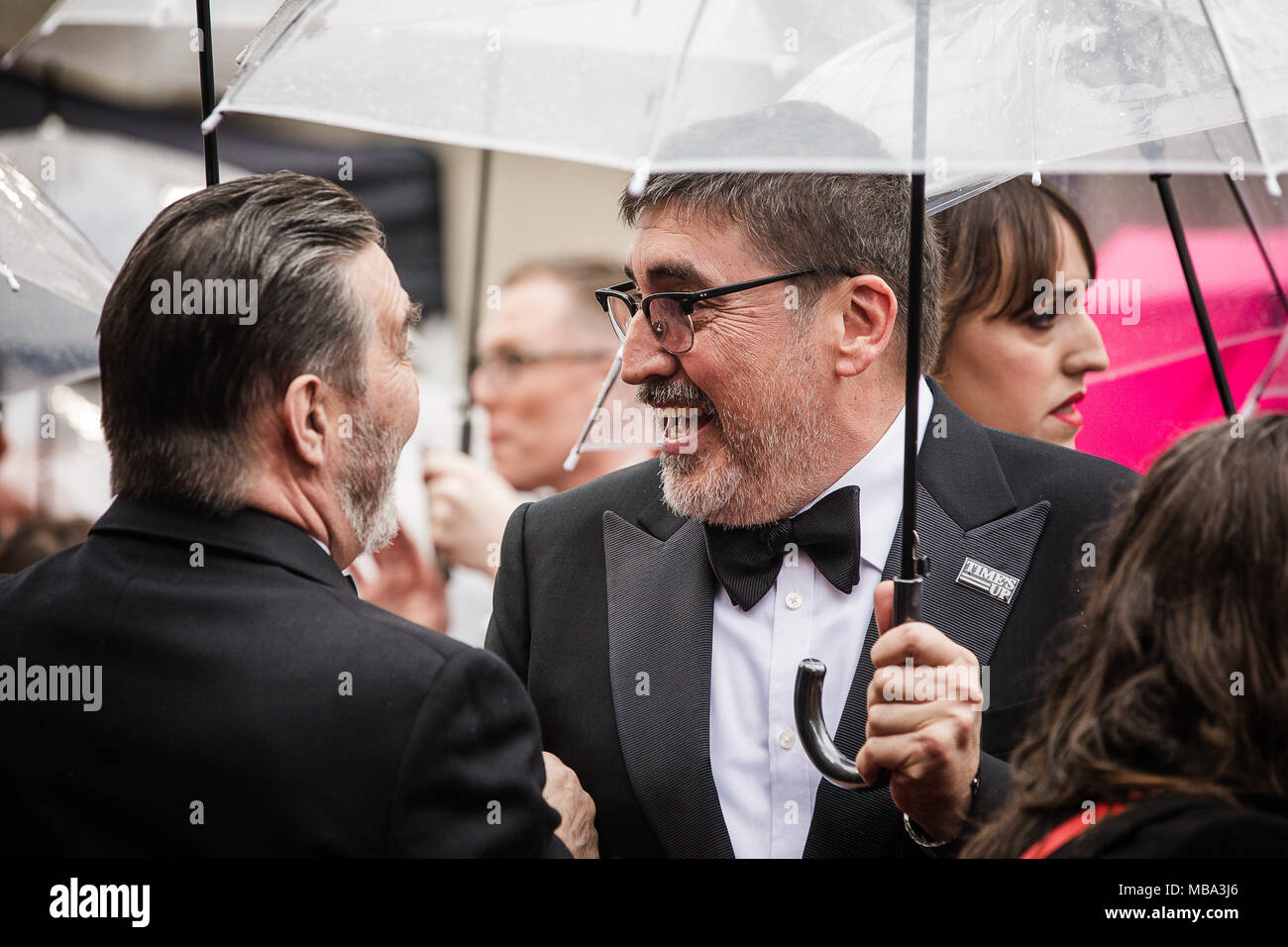 London, UK. 8th April, 2018. British-American actor and voice actor Alfred Molina poses in the rain on the red carpet at the 2018 Olivier Awards held at the Royal Albert Hall. Credit: David Betteridge/Alamy Live News Stock Photo