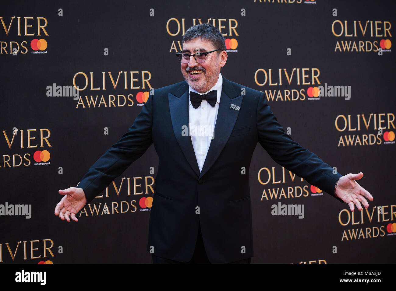 London, UK. 8th April, 2018. British-American actor and voice actor Alfred Molina poses in the rain on the red carpet at the 2018 Olivier Awards held at the Royal Albert Hall. Credit: David Betteridge/Alamy Live News Stock Photo