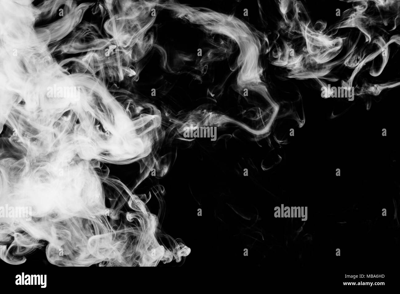 White cloud smoke on black isolated background Stock Photo - Alamy