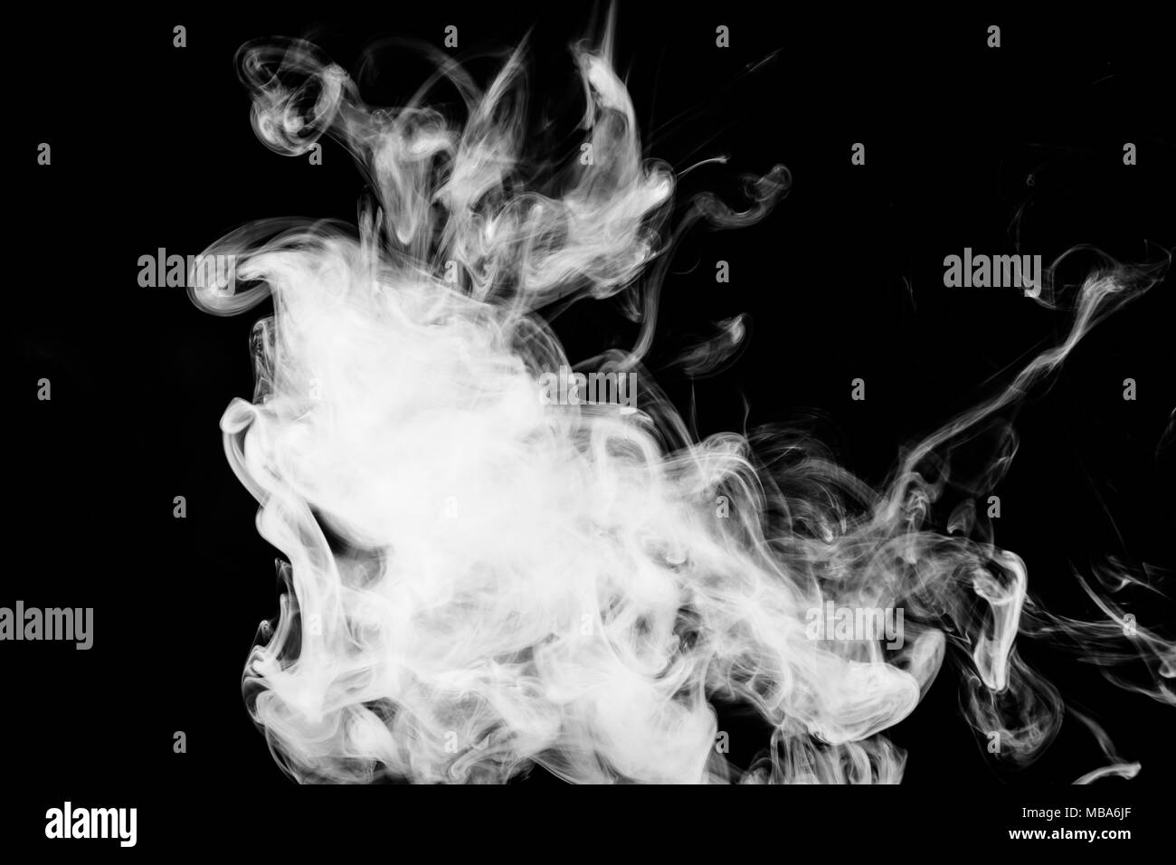 White cloud smoke on black isolated background Stock Photo - Alamy