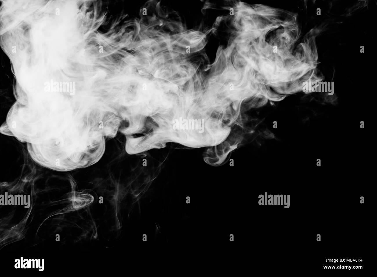 White cloud smoke on black isolated background Stock Photo - Alamy