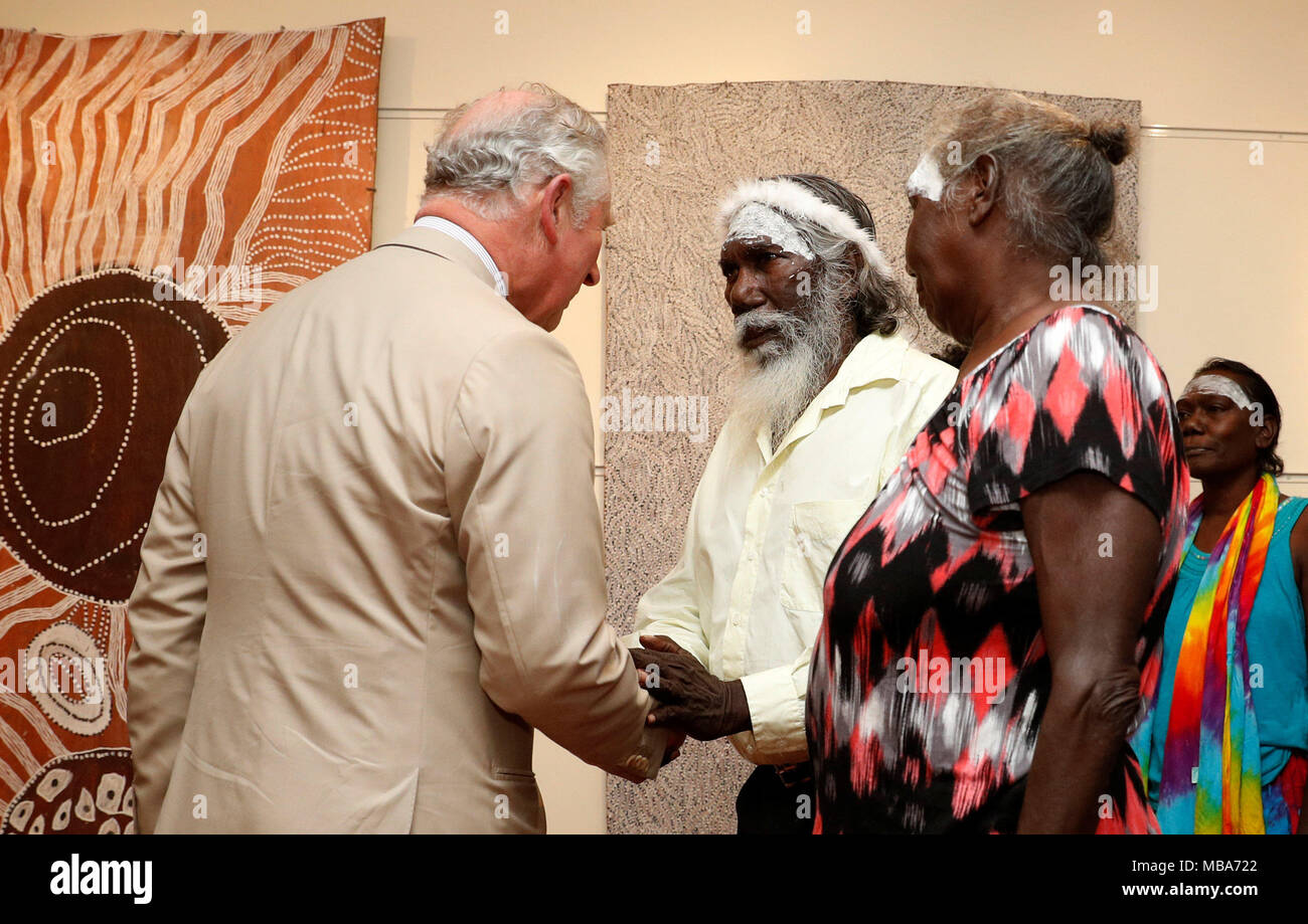 The Prince of Wales shakes hands with a didgeridoo player as he visits the Buku-Larrnggay Mulka Centre in Yirrkala, in Australia's Northern Territory. Stock Photo