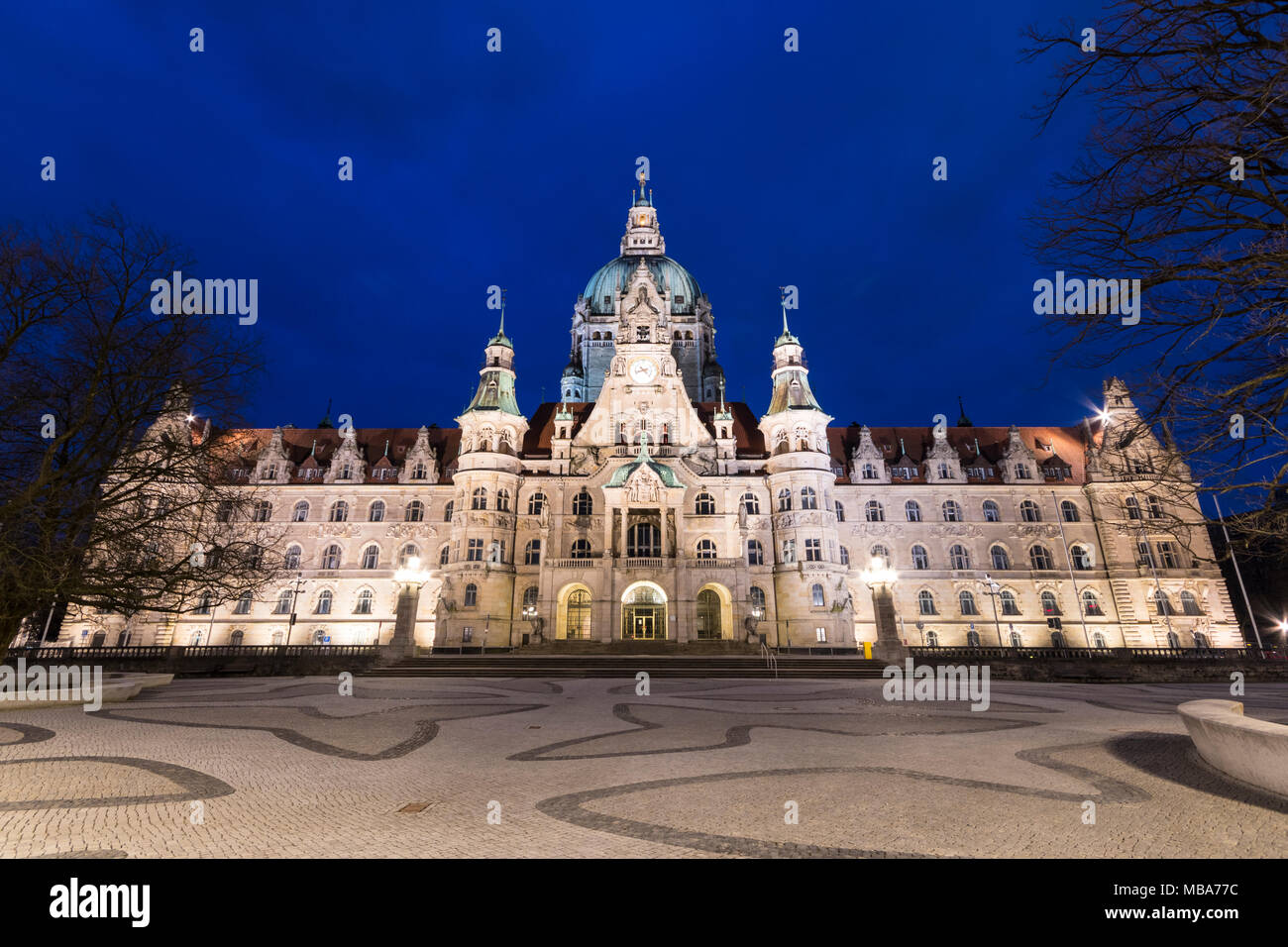 Hannover, Germany. Night view of the New Town Hall (Neues Rathaus), a magnificent castle-like city hall of the era of Wilhelm II in eclectic style Stock Photo