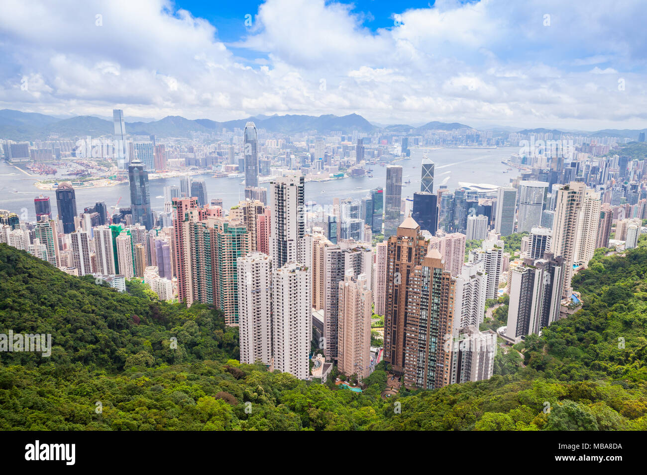 Hong Kong city, aerial view taken from Victoria Peak viewpoint in sunny summer day Stock Photo