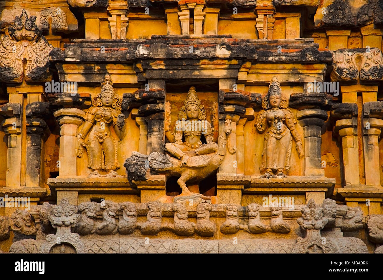 Carved pillars and idols on the outer wall of the Brihadishvara Temple, Thanjavur, Tamil Nadu