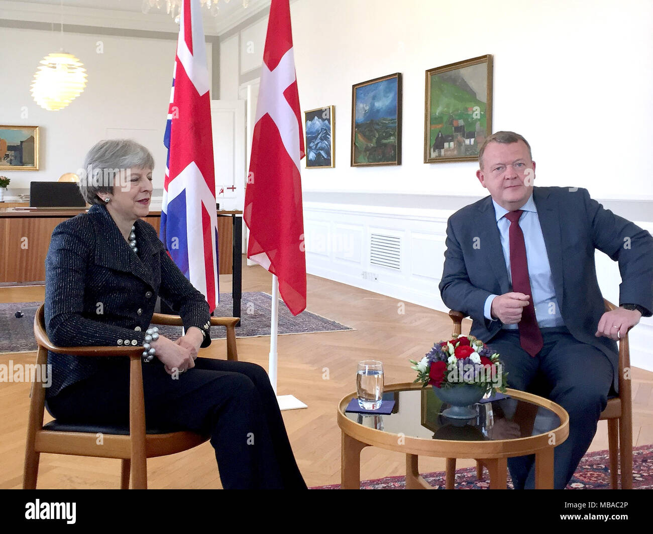 Theresa May alongside Danish PM Lars Rasmussen inside Christiansborg Castle, Copenhagen, as the two leaders are expected to discuss Brexit as well as the threat Russia poses to international security during the one-day trip. Stock Photo