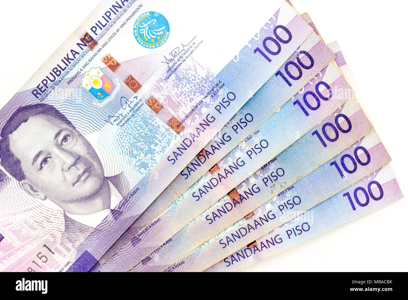 Currency banknotes spread across frame philippines peso in various denomination Stock Photo