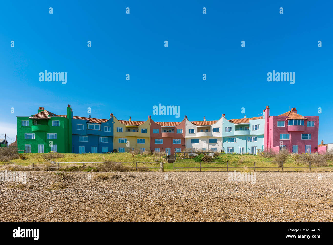 Thorpeness Suffolk UK, view of The Headlands, a colorful row of houses dating from 1937 situated on the beach at Thorpeness on the Suffolk coast, UK. Stock Photo
