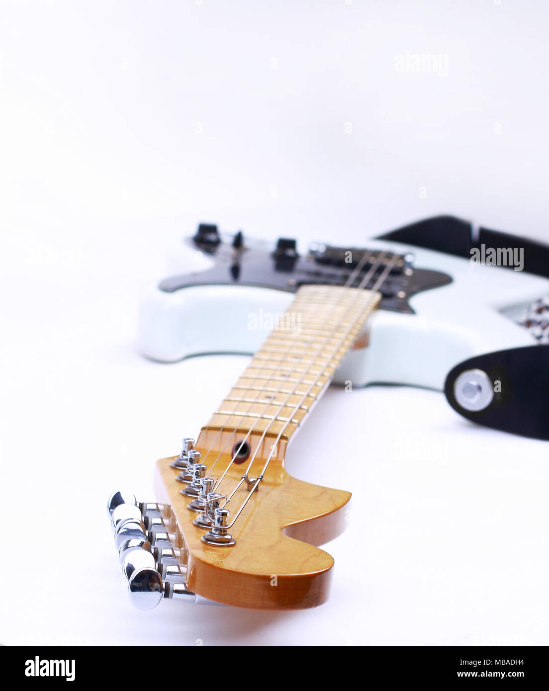 Guitar on a white background with Stock Photo - Alamy