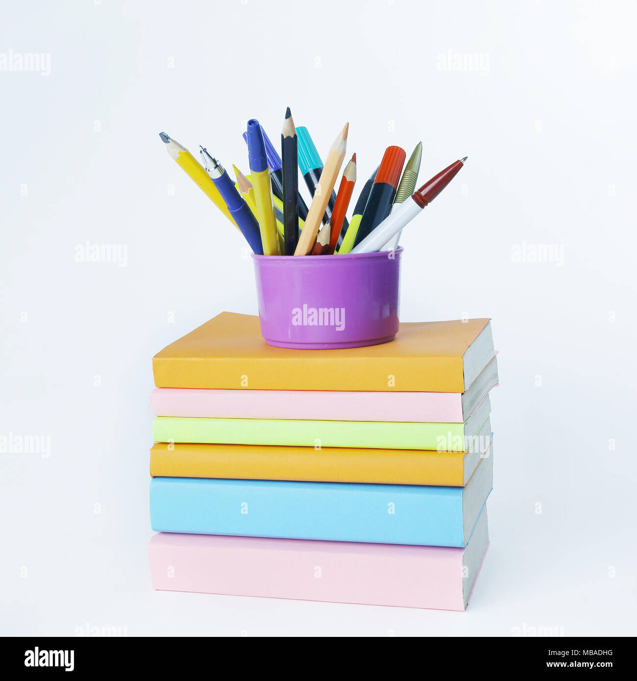 stand with pencils on a stack of books .photo with copy space Stock ...