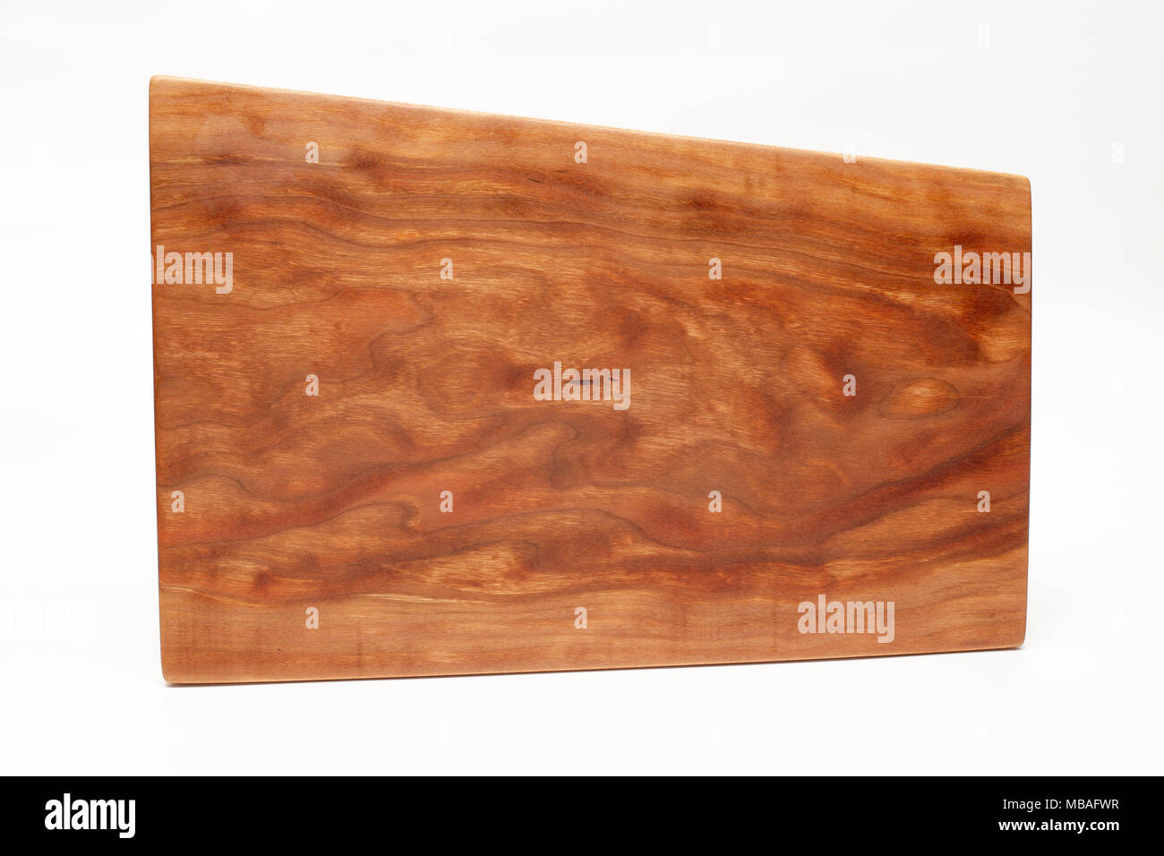 Isolated cutting board for use as a background. Stock Photo