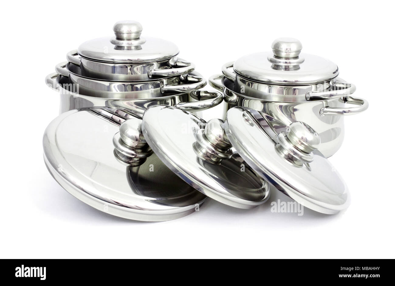 Pans made of stainless steel on a white background Stock Photo Alamy