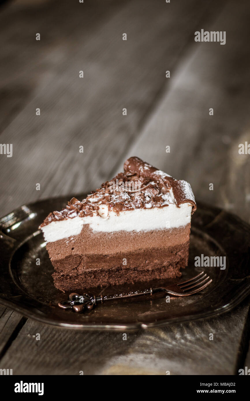 Chocolate Birthday Cake On A Rustic Vintage Plate And Wooden Table Stock Photo Alamy
