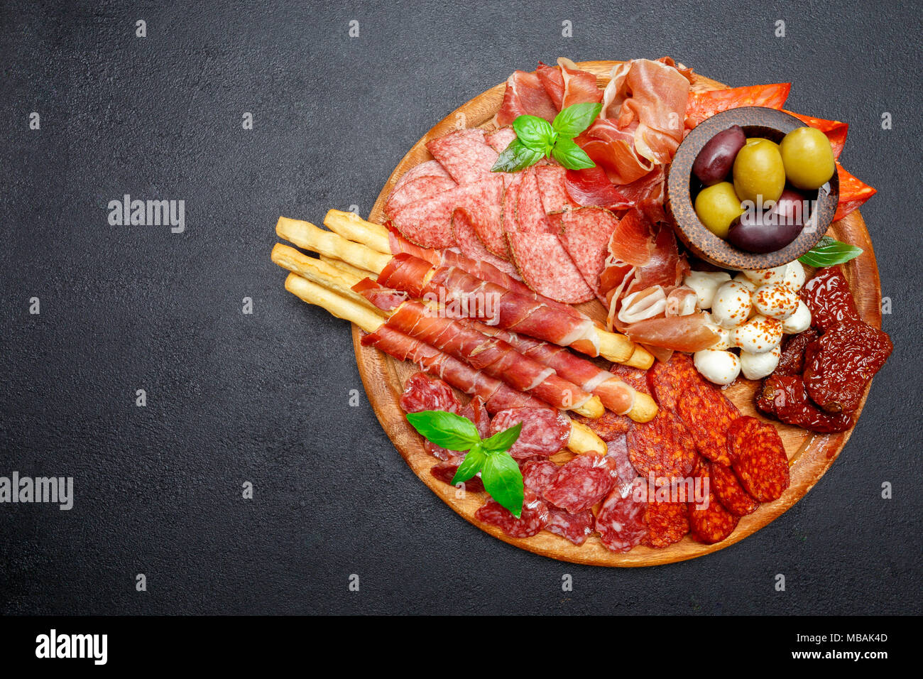 Meat and cheese plate with salami sausage, chorizo, parma and mozzarella  Stock Photo - Alamy