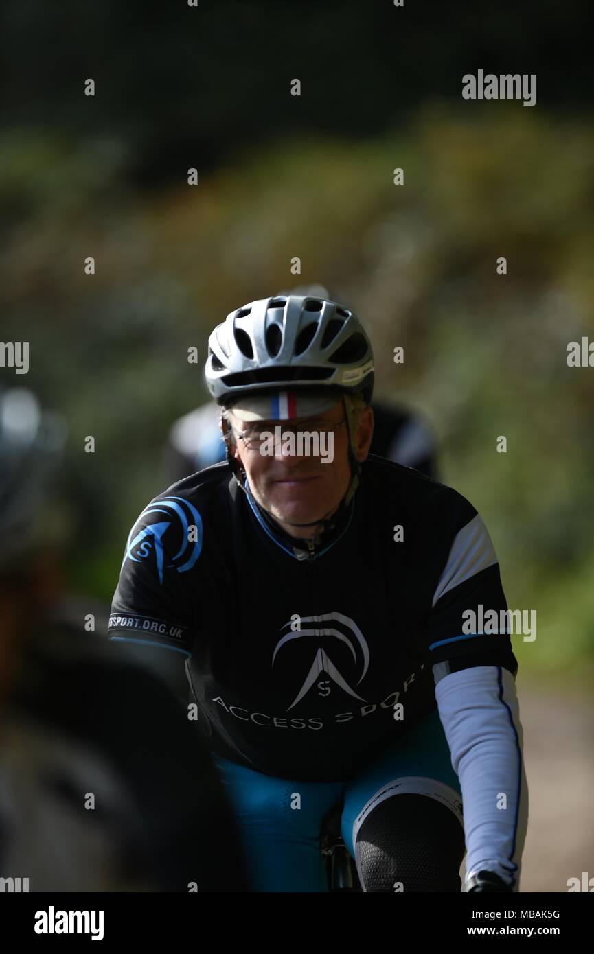 Bicycle riders riding through the countryside Stock Photo - Alamy