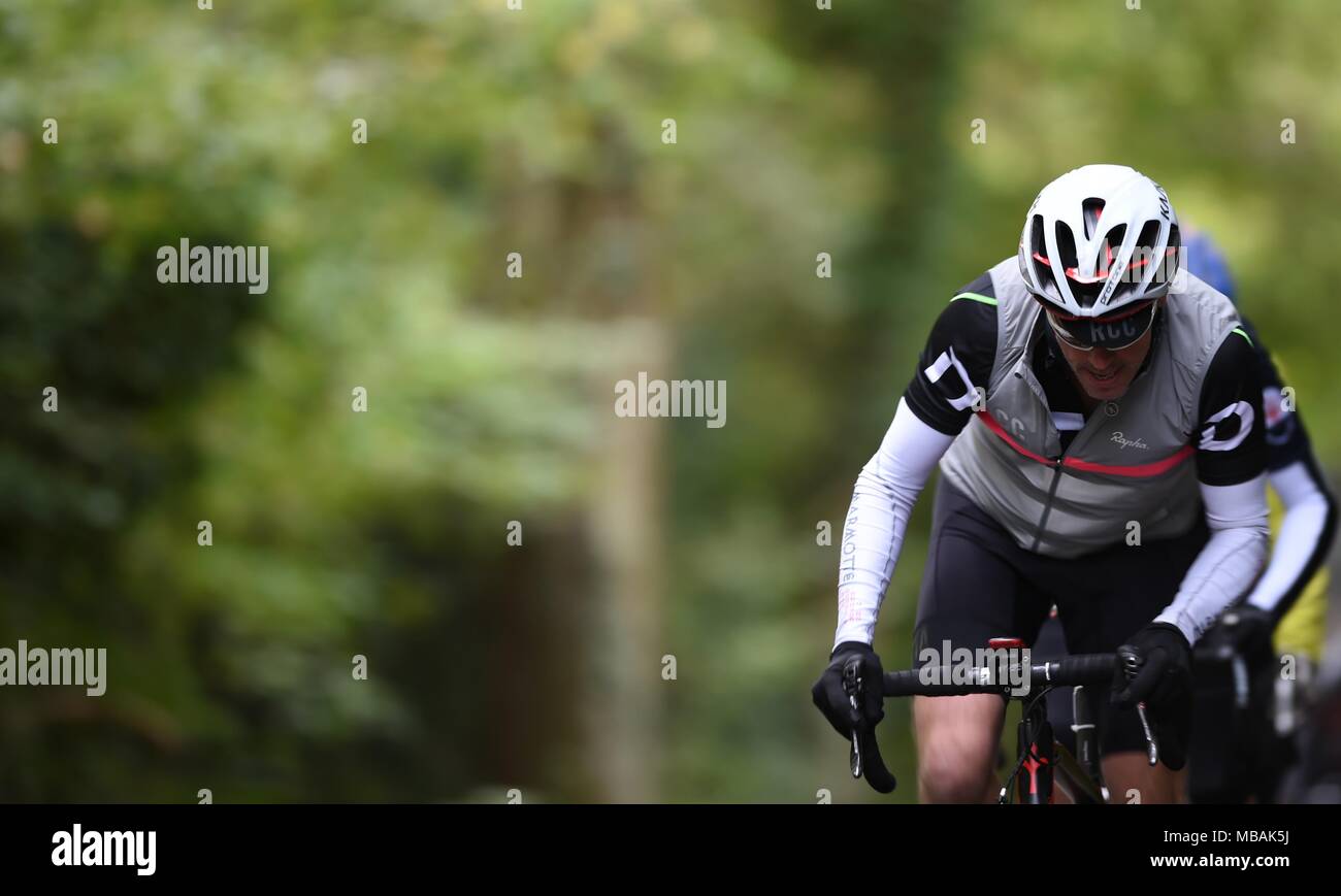 Bicycle riders riding through the countryside Stock Photo - Alamy