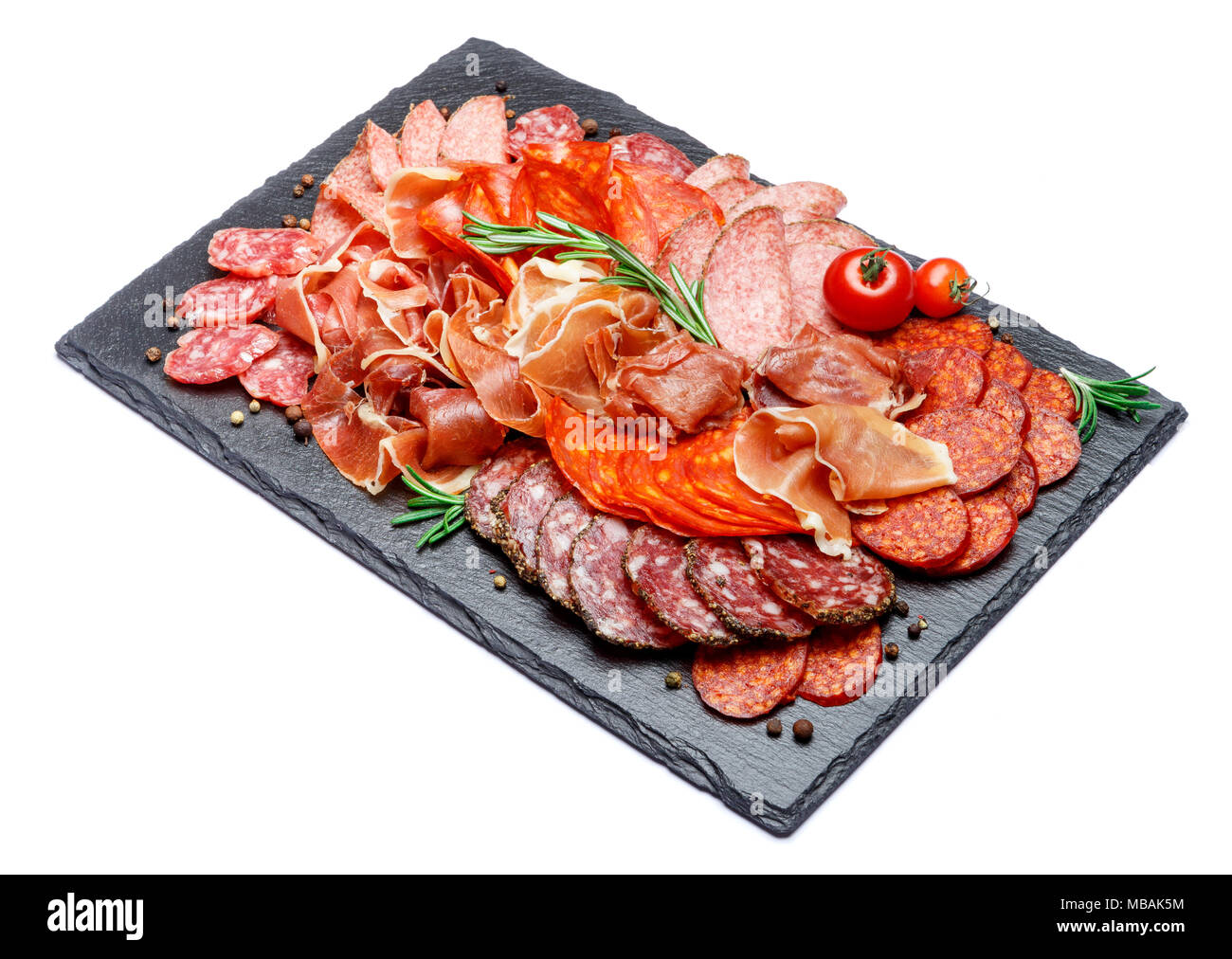 Various types of Dried organic salami sausage and parma on white ...