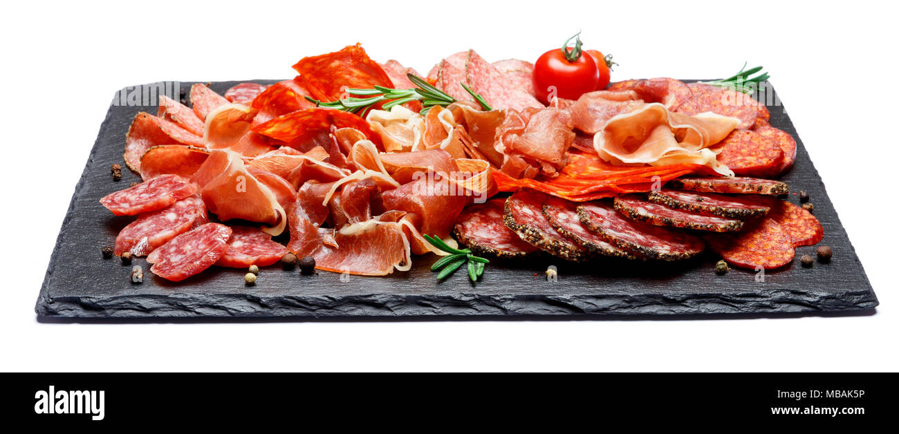 Various types of Dried organic salami sausage and parma on white ...