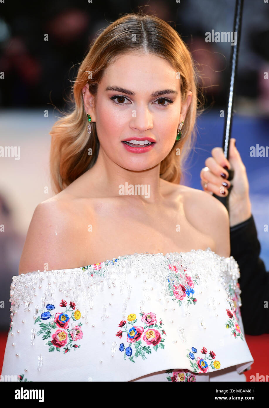 Lily James attending The Guernsey Literary and Potato Peel Pie Society