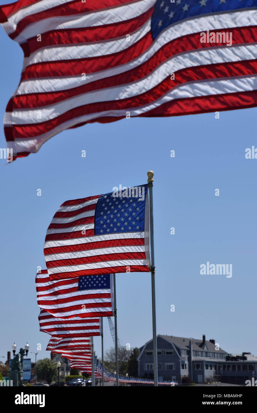 American flags flying along the walkway at Gloucester Massachusetts Stock Photo