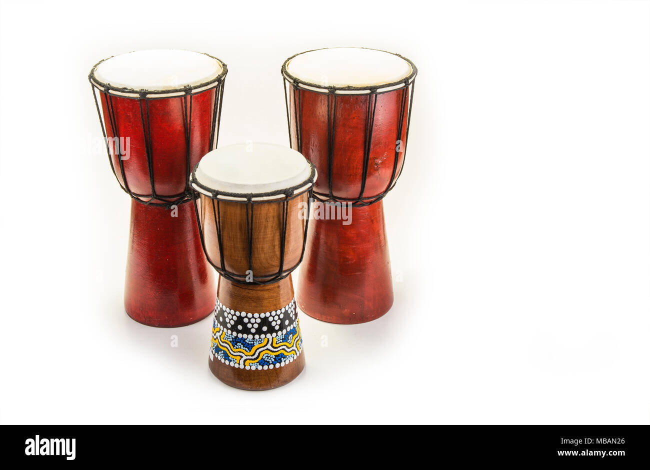 Wooden african handmade djembe drum on white Stock Photo Alamy