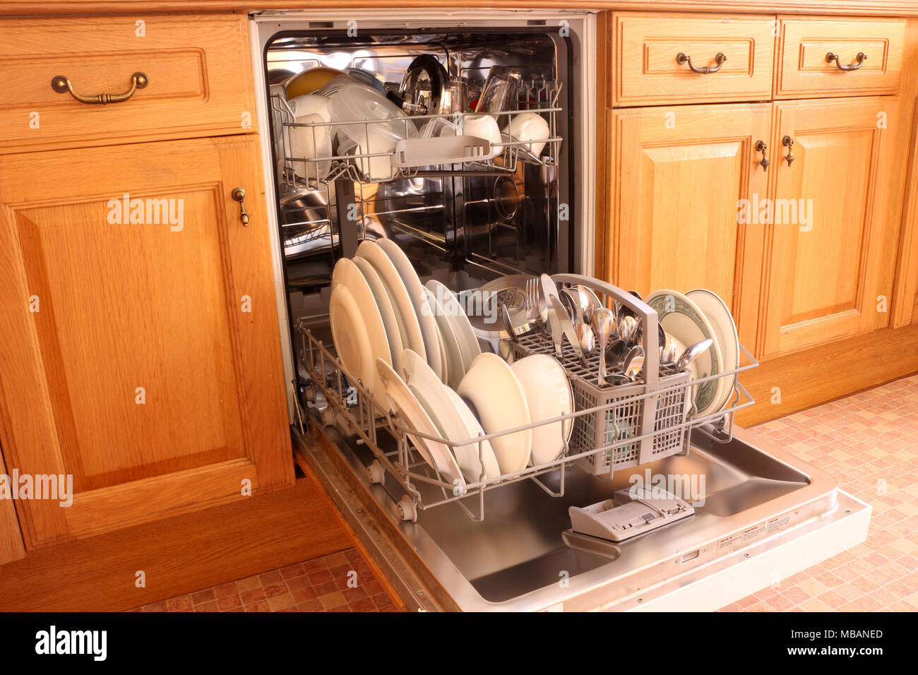 Open dishwasher with clean dishes Stock Photo Alamy