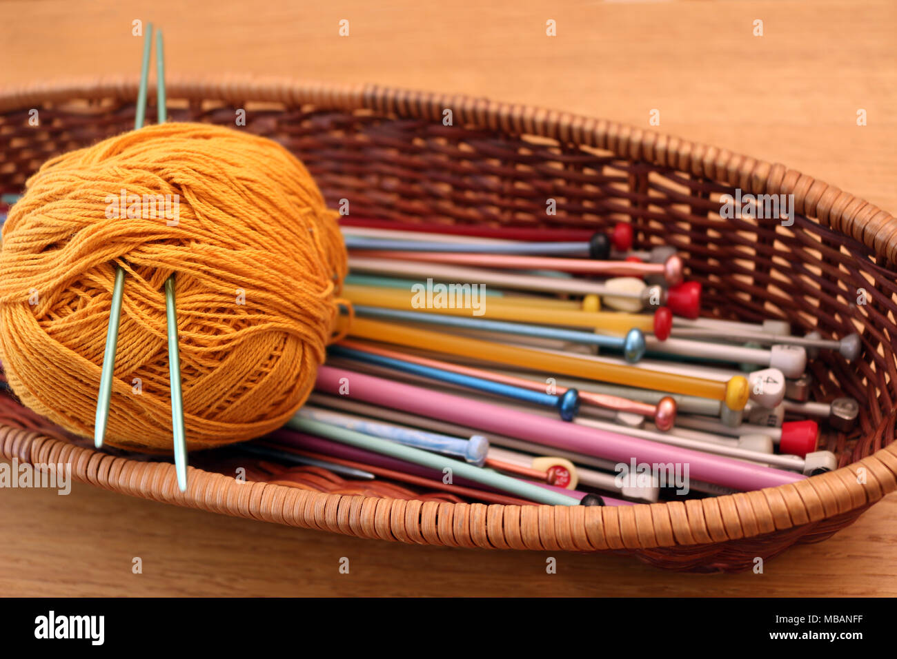 Knitting Needles in a Basket Stock Photo