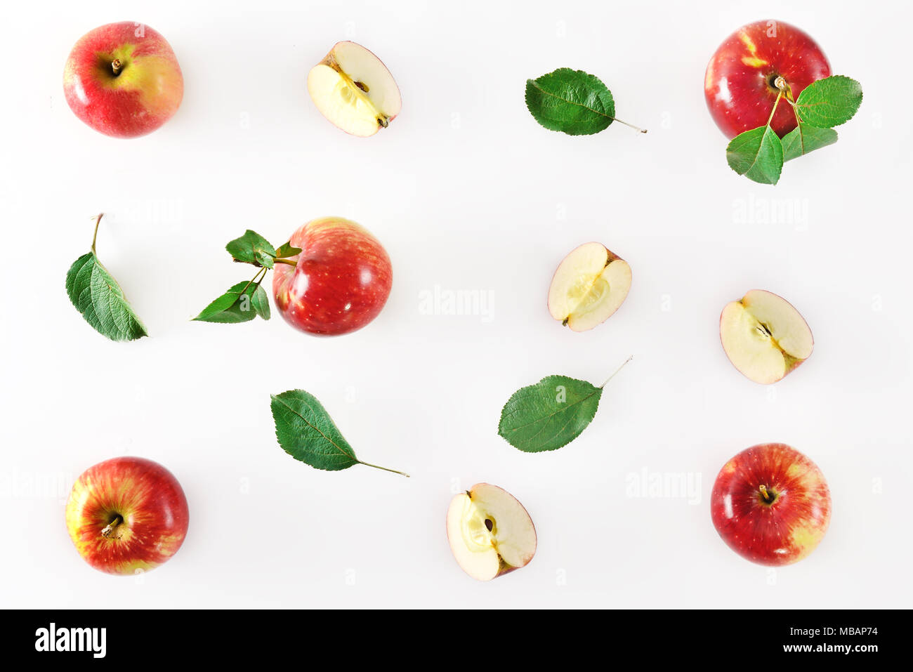 Red apple fruits on white background. Pattern with apples flat lay. Top view. Stock Photo