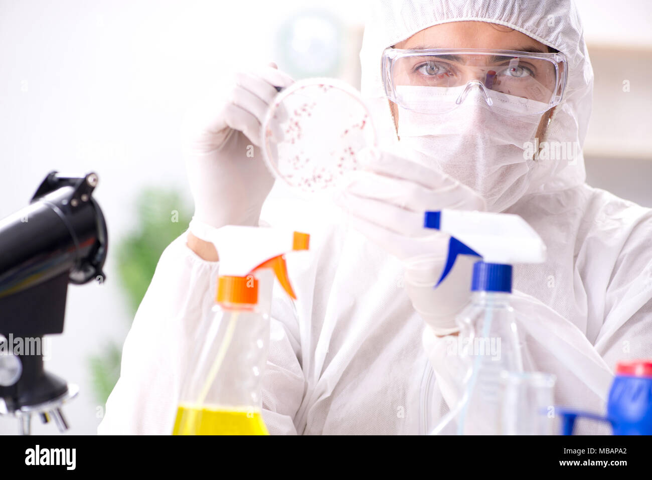 Chemist testing chemical substances in lab Stock Photo Alamy