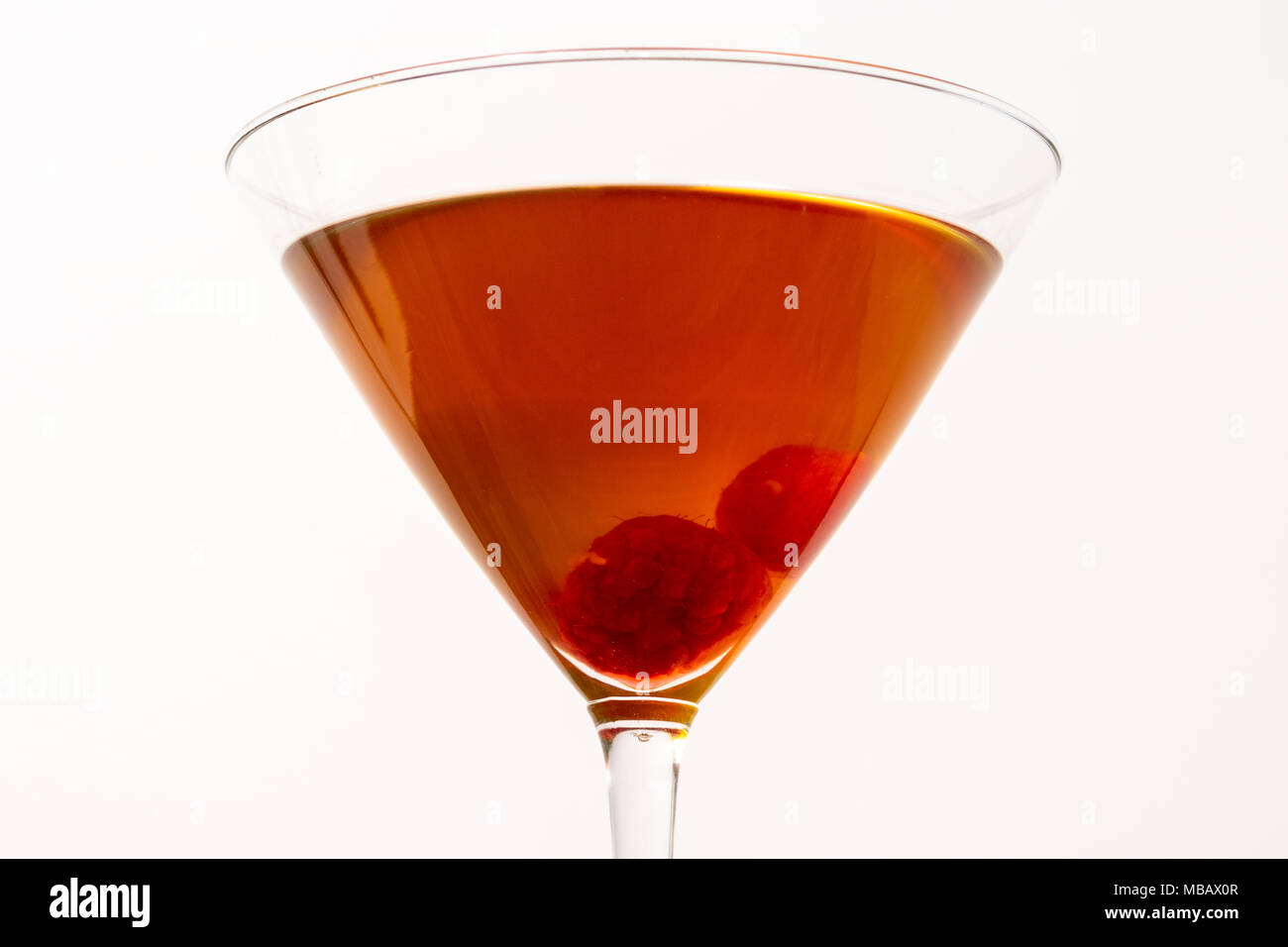 close up of a cocktail with white background, with raspberry Stock Photo