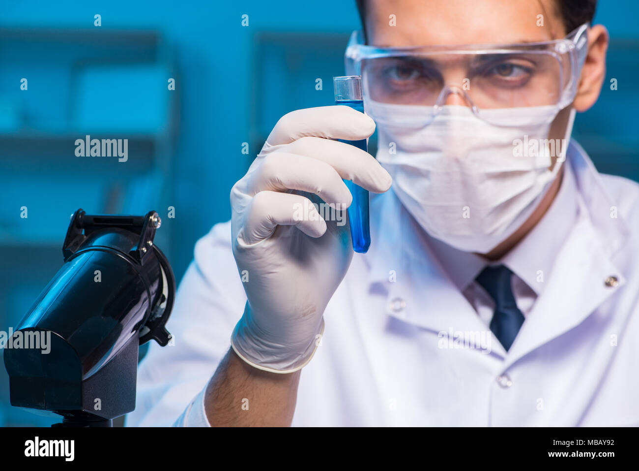 Chemistry assistant working in the chemical lab Stock Photo - Alamy