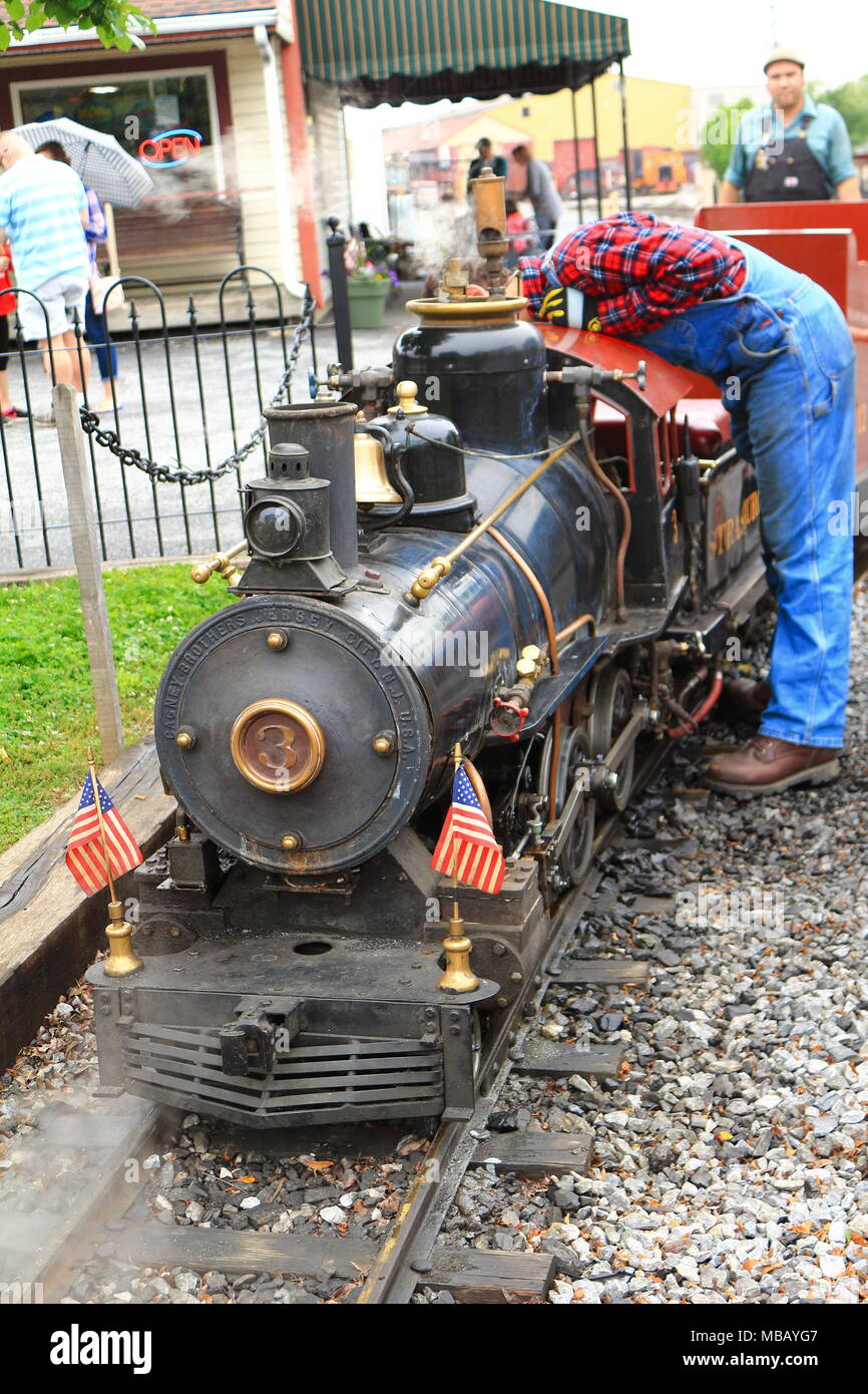 Engineer preparing a miniature steam for a run Stock Photo