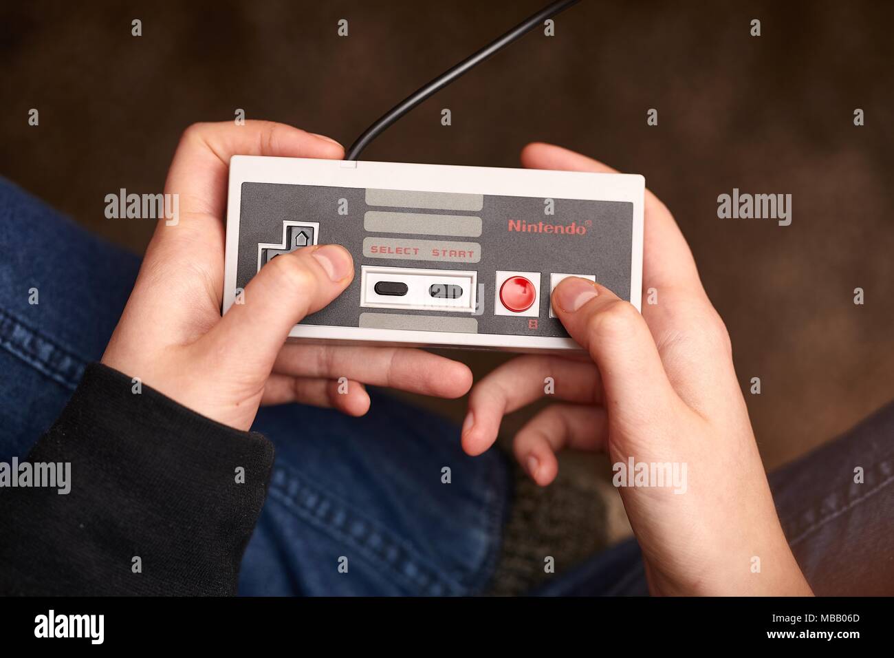 Nintengo NES,playing Super Mario 3 Stock Photo