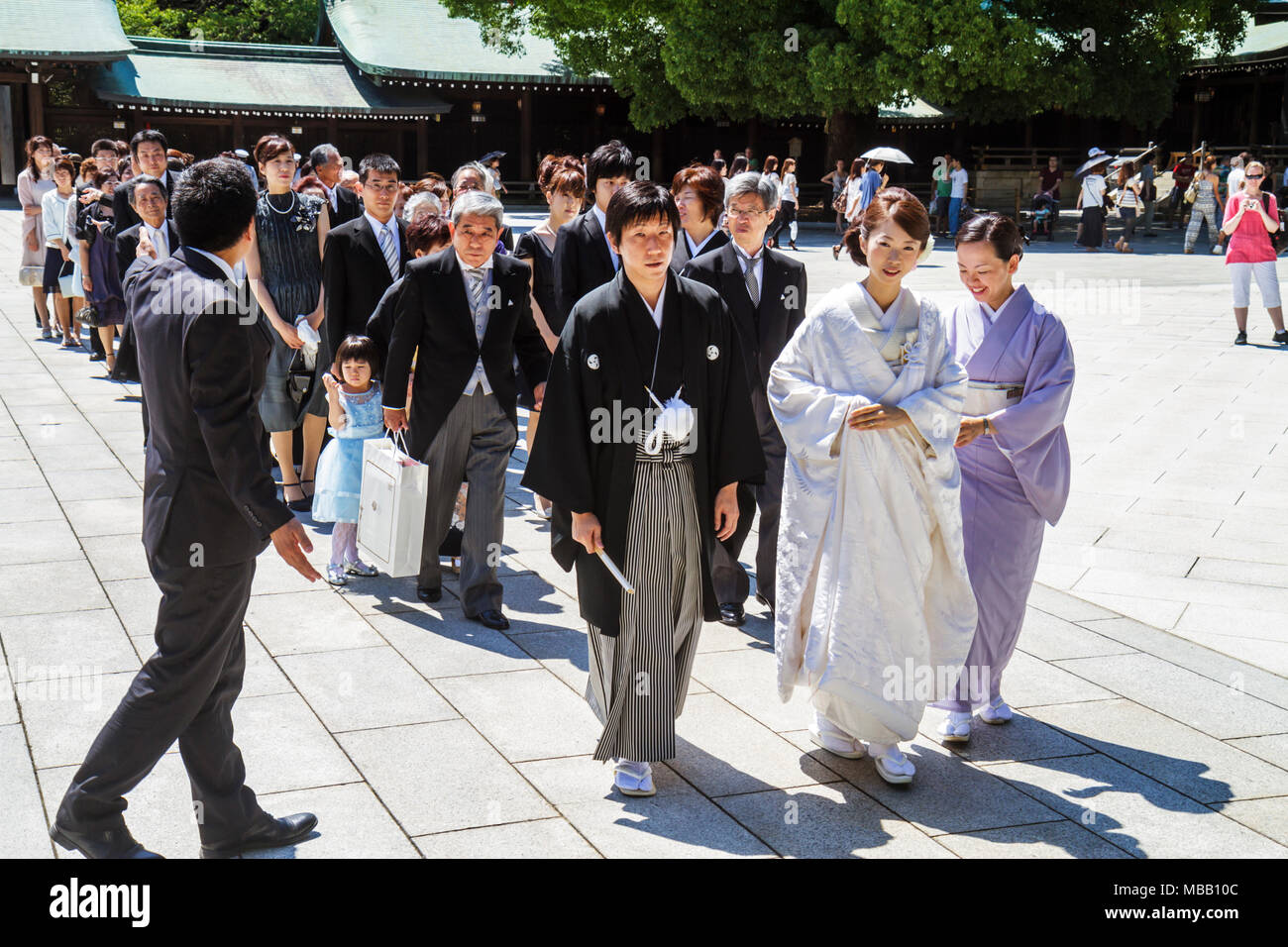 Tokyo Japan,Shibuya ku,Meiji Jingu Shinto Shrine,wedding,ceremony,procession,line,queue,Asian Oriental,men,women,bride,groom,attendants,Japanese,Orien Stock Photo