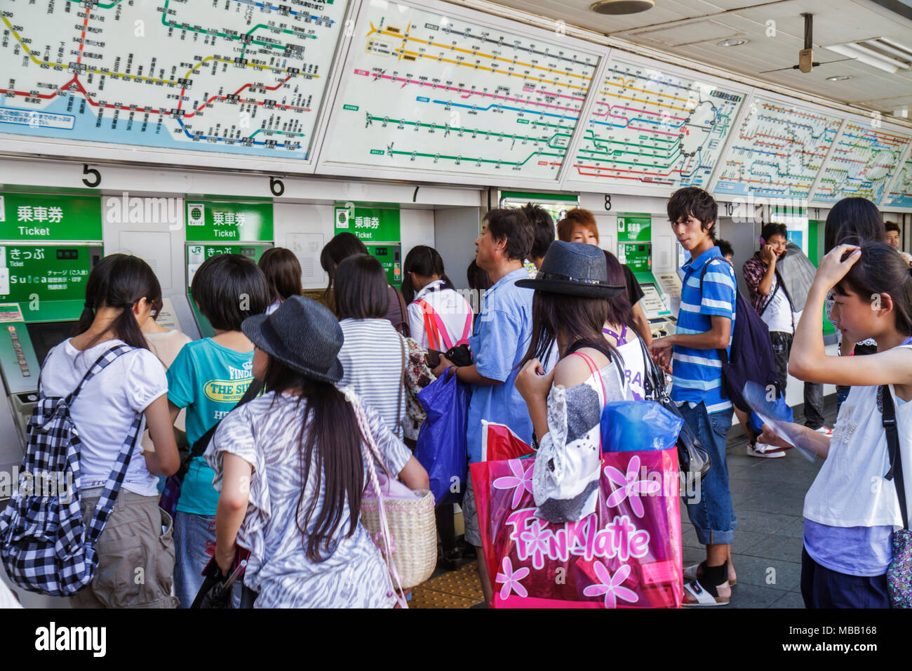 Tokyo Japan,Asia,Orient,Harajuku,JR Harajuku Station,Asian Asians ethnic immigrant immigrants minority,Oriental,teen teens teenage teenager teenagers Stock Photo