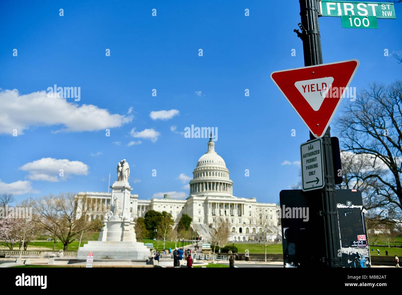 Yield sign in front of the United States Capitol building in Washington DC, USA Stock Photo