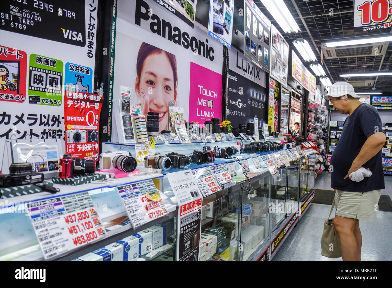 Tokyo Japan,Asia,Orient,Shinjuku,electronics store,digital cameras,retail products,display case sale,merchandise,packaging,brands,brands,Panasonic,Pen Stock Photo