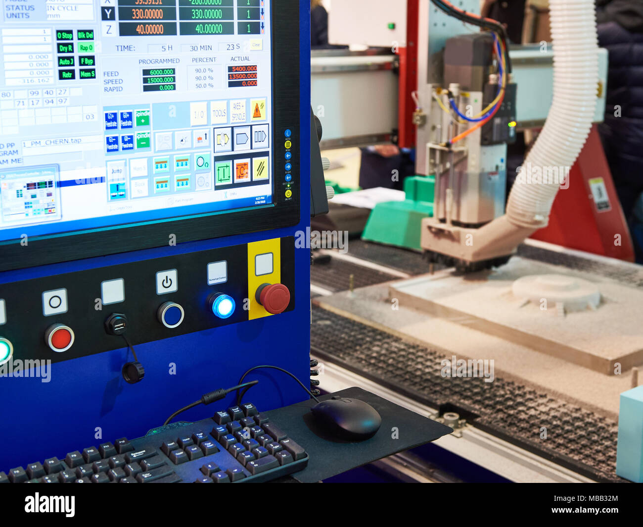 CNC machine tool for 3D object simulation with monitor Stock Photo